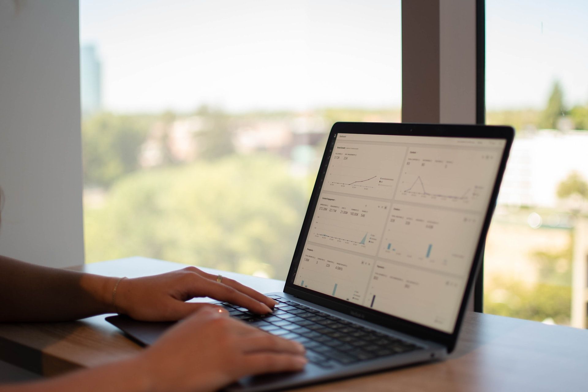 a person viewing data on a laptop