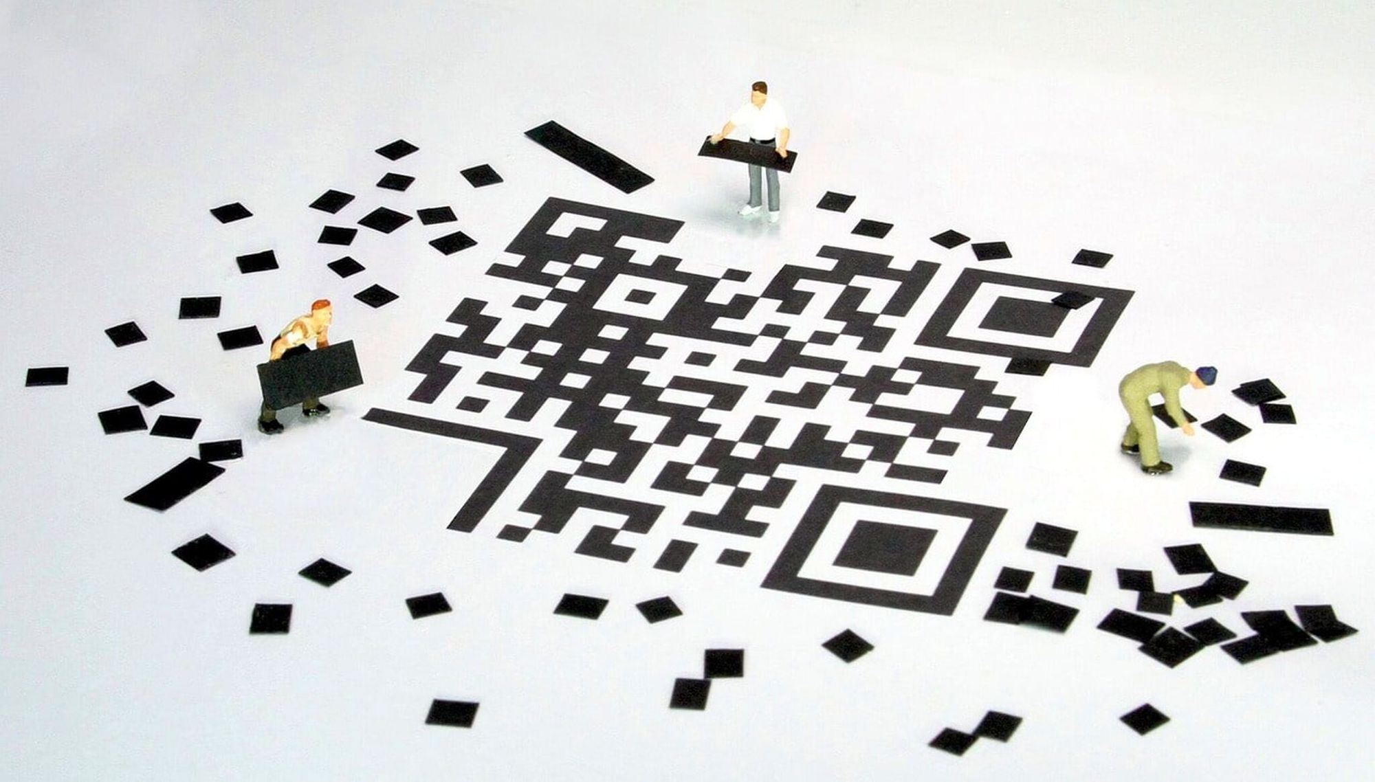making of QR code with miniature figures