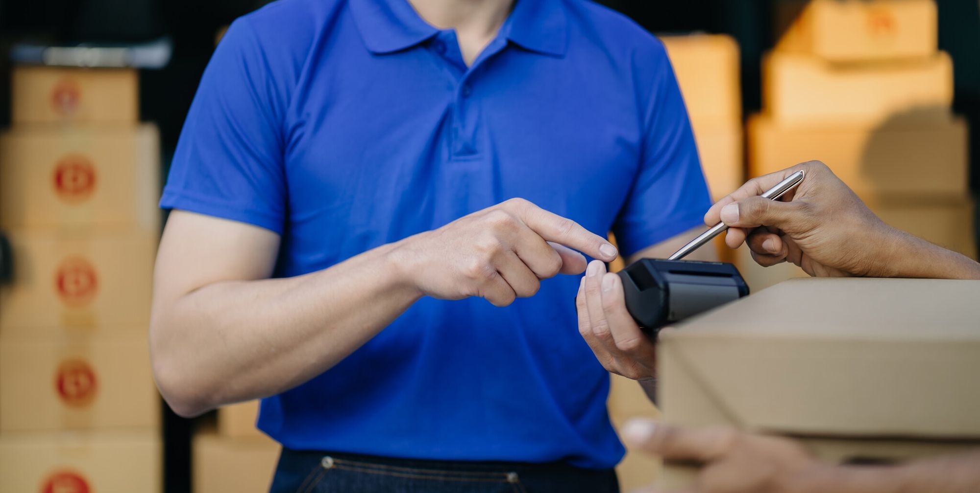 a man hand scanning a QR code