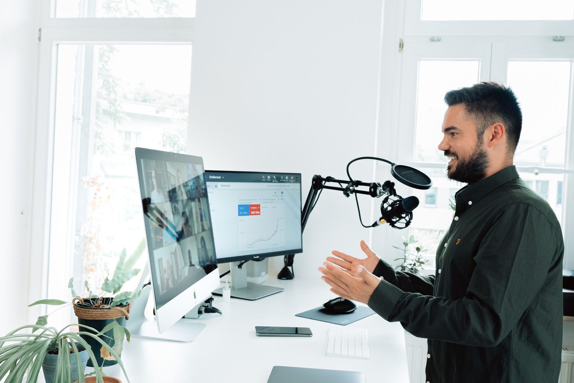 a man speaking at a webinar