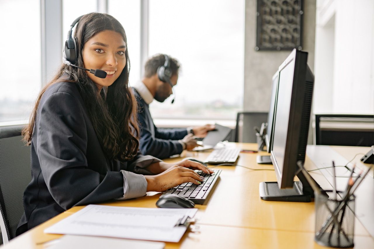 a customer support smiling