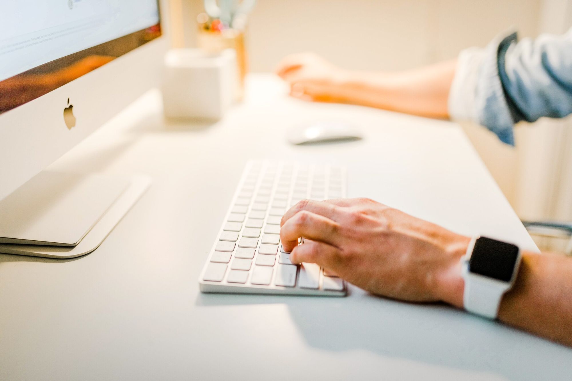 a person using iMac