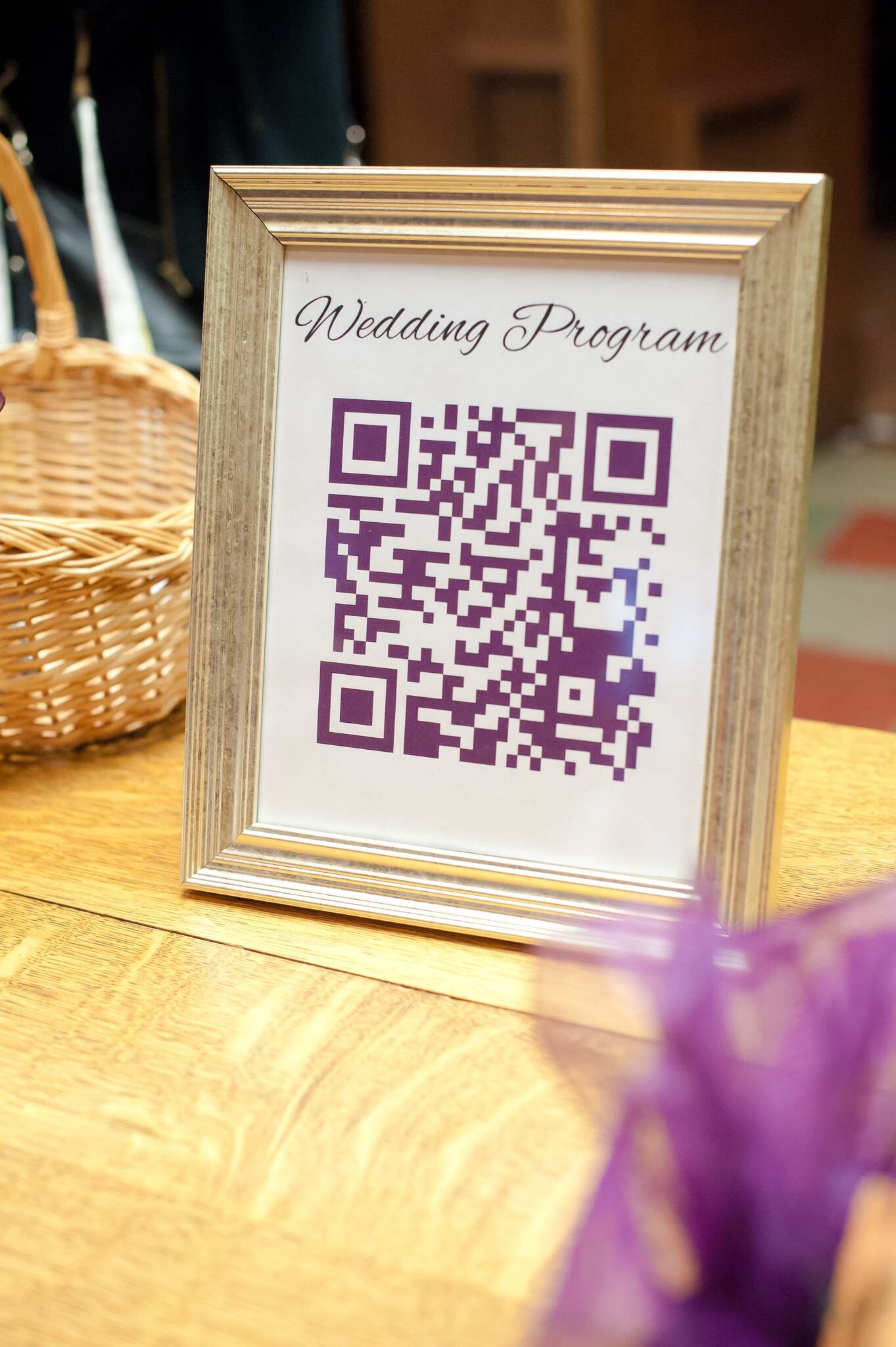 A frame that has a QR code for the wedding program